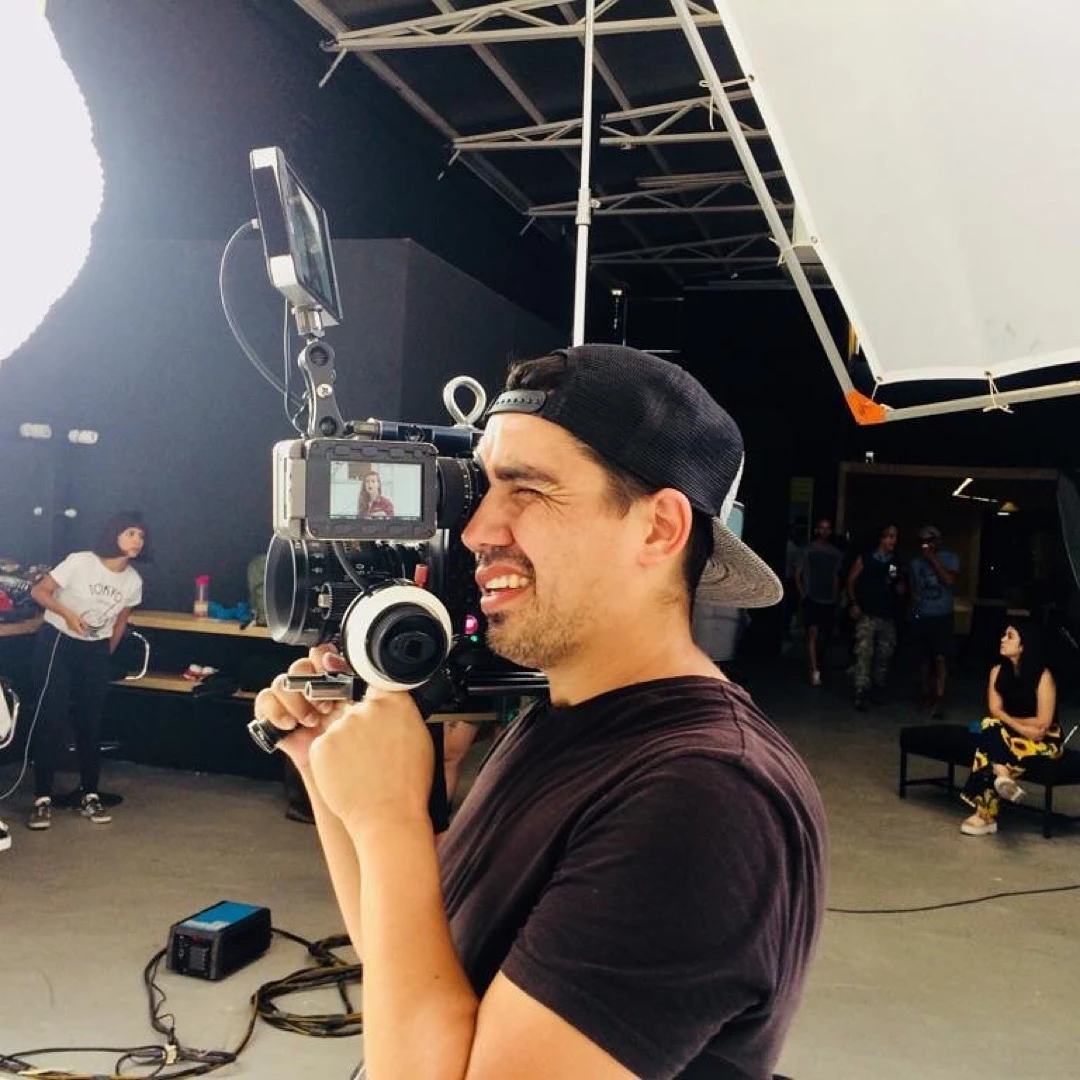 The In America Studio room: modern cinema and photo cameras with an LED film light under gold light